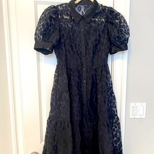 Brand new English Factory size small dress.  Illusion style.  Stunning.